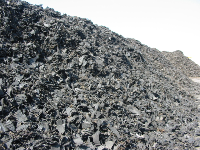 Pile of shredded black rubber particles
