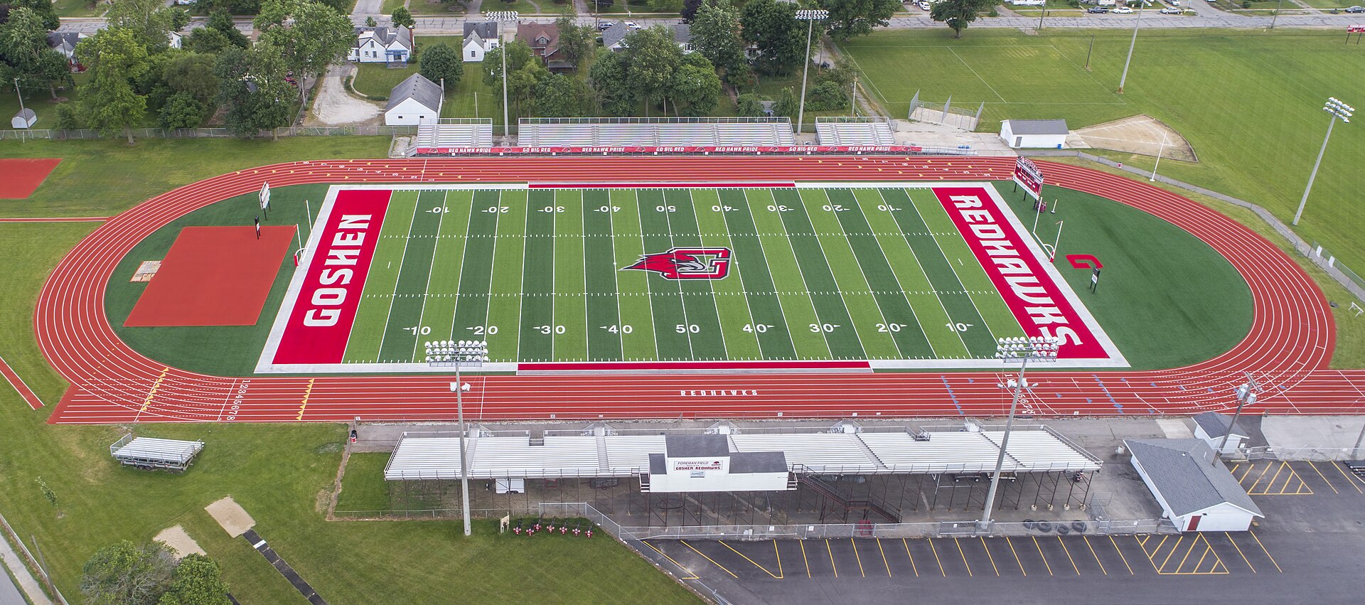 Wide view of a green artificial-turf playing field